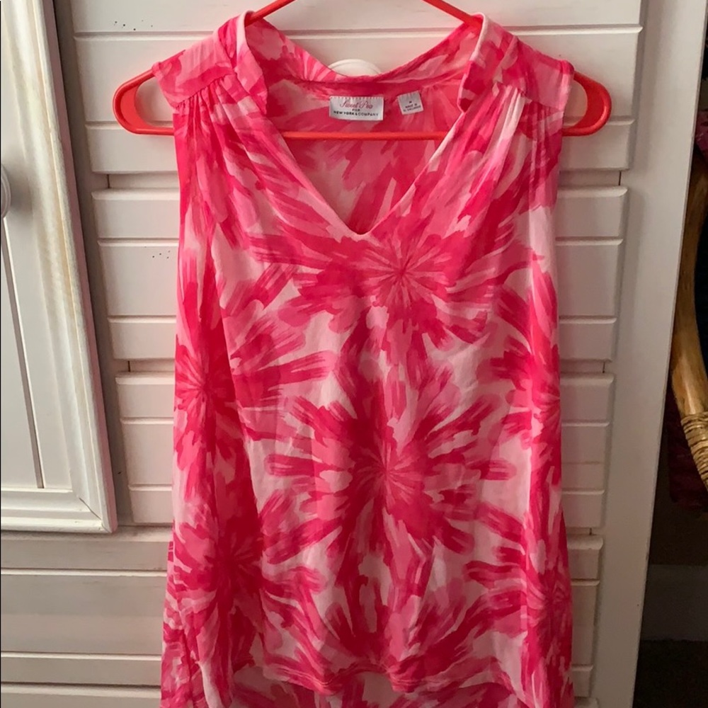 Longer style sleeveless blouse